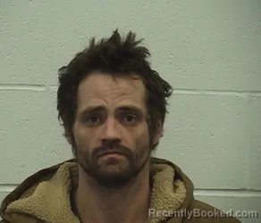 Mugshot of BRANDON L REED