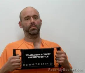 Mugshot of DUSTIN DEON HOLLAND