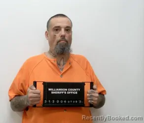 Mugshot of DERRALL L ENLOW