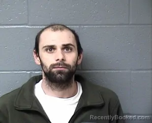 Mugshot of TRAVIS L CARUSO