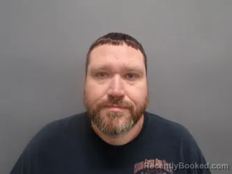 Mugshot of RYAN DYONIS MILLER