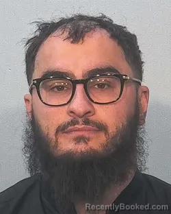 Mugshot of Reshi Edilov