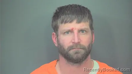 Mugshot of Logan T Barrett