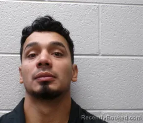 Mugshot of MOISES RAMON ARTUNEZ RODRIGUEZ