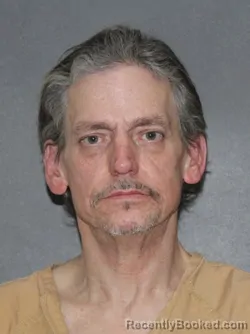 Mugshot of Matthews Eugene Mann