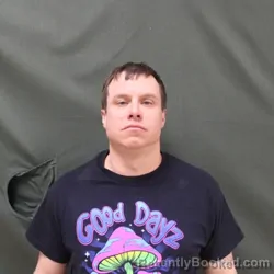 Mugshot of TYLER J. HENADY