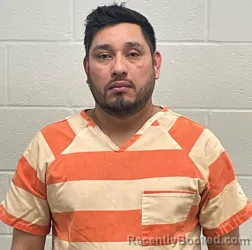 Mugshot of HECTOR ADELMO MUJ REYES