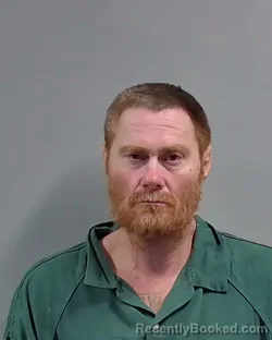 Mugshot of JUSTIN WILLIAM DELIS