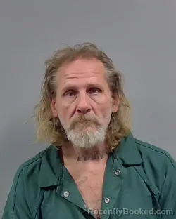 Mugshot of CRAIG E ADAMS