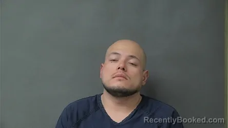 Mugshot of BRAULIO NMI ORTIZ-MARTINEZ