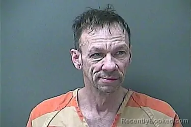 Mugshot of MICHAEL D SCHACKART