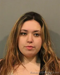Mugshot of CORINA ESPERANZA OPEHELIA PENA