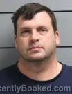 Mugshot of JUSTIN MICHAEL WILCOX