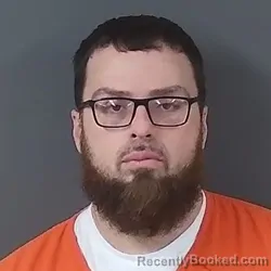 Mugshot of Aron J. Monnett