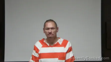 Mugshot of Jason E Adkins