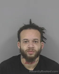 Mugshot of ANDRE QUEMERE J HOLLEY