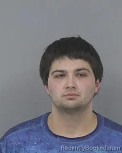 Mugshot of CHRISTIAN ELIJAH HOLLAND