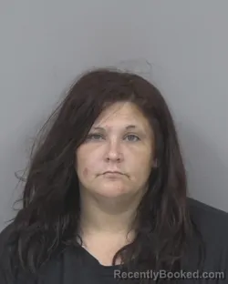 Mugshot of AMBER DENISE RAYNOR