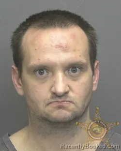 Mugshot of JUSTIN DEWYANE ALVEY