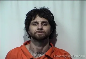 Mugshot of JUSTIN BRADLEY HARRISON