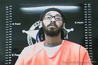 Mugshot of DELWYN QUENARD THOMAS