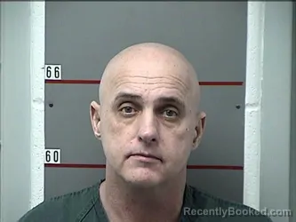 Mugshot of MICHAEL BREWER