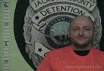 Mugshot of DUSTIN WAYNE ROWLAND