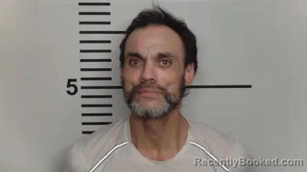 Mugshot of DOUGLAS EUGENE ALEXANDER