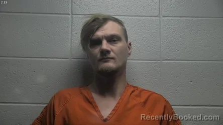 Mugshot of AUSTIN T COOPER