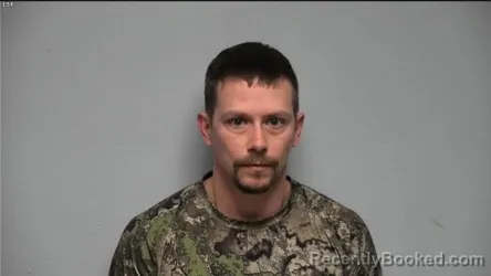 Mugshot of JUSTIN KEITH MATHEWS