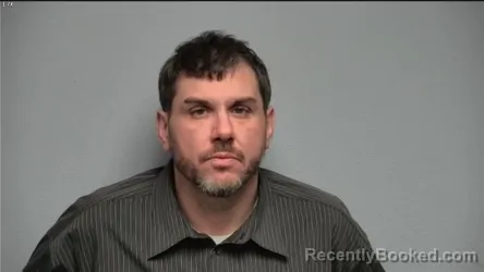 Mugshot of KYLE RAYMOND WEIKEL