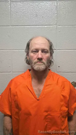 Mugshot of ALVA COMBS