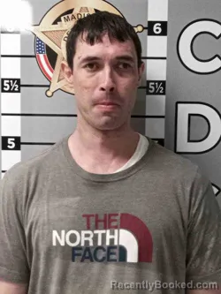 Mugshot of BRANDON RHODUS