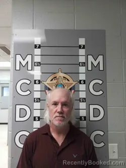 Mugshot of JASON BARKER