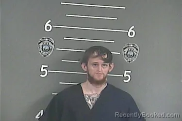 Mugshot of EVAN J FISHER