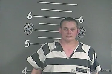 Mugshot of MICHAEL . KELLY