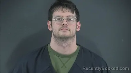 Mugshot of KYLE ROWE