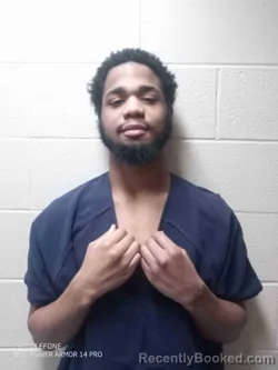 Mugshot of MYLES THOMAS