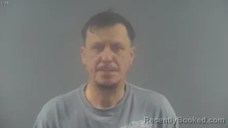 Mugshot of CLINTON EUGENE HULSHART