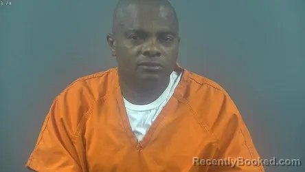 Mugshot of ESEMBE ASUMANI