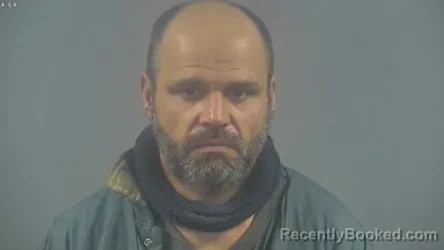 Booking photo from Warren County, Kentucky