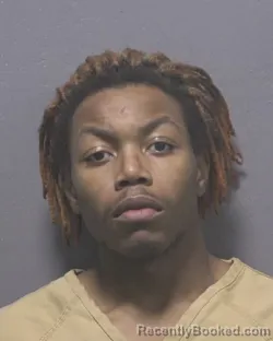 Mugshot of JUSTIN SINTYAGO