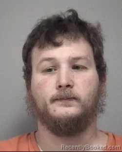 Mugshot of REX LYLE SCHUMACHER