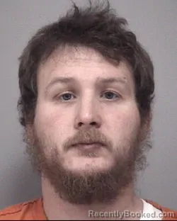 Mugshot of REX LYLE SCHUMACHER