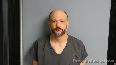 Mugshot of JORDAN JOHN TOMICH