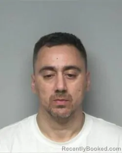 Mugshot of JESSIE SANTOS