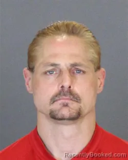 Booking photo from St Clair County, Michigan