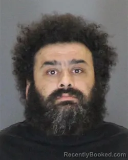 Mugshot of TEWFFEEG SAAD ALMONTASER