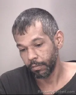 Mugshot of JUSTIN JACOBS