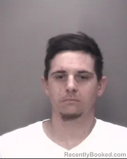 Mugshot of JAMES TYLER MARSHBURN